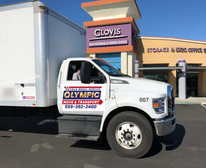 Olympic Move & Transport truck on a job in Clovis